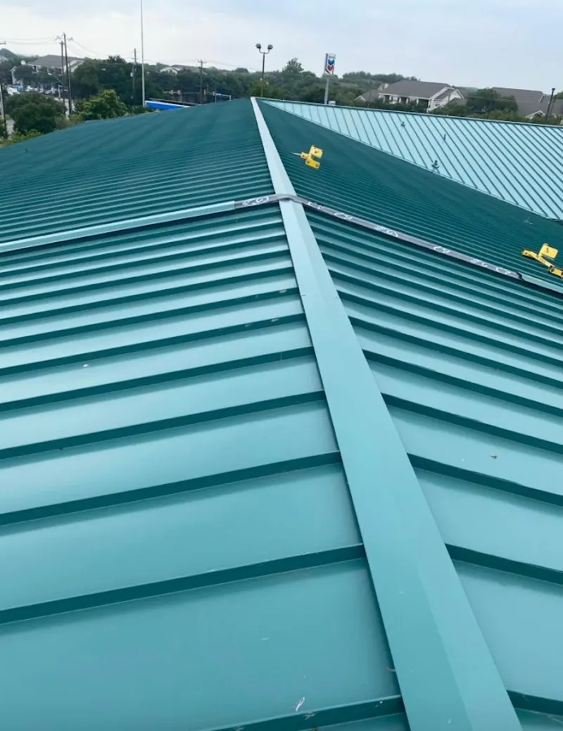 Green commercial metal roof ridge and valley for Metal Roof Repair in Stockbridge